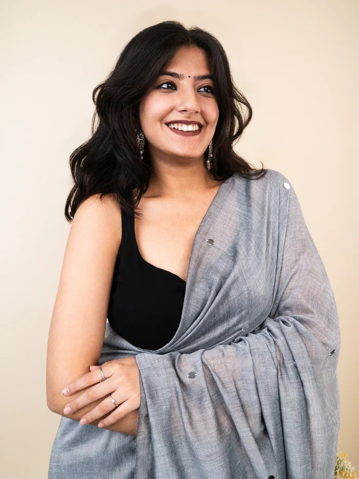 Gray plain khadi cotton saree with ginni and fancy tassel work
