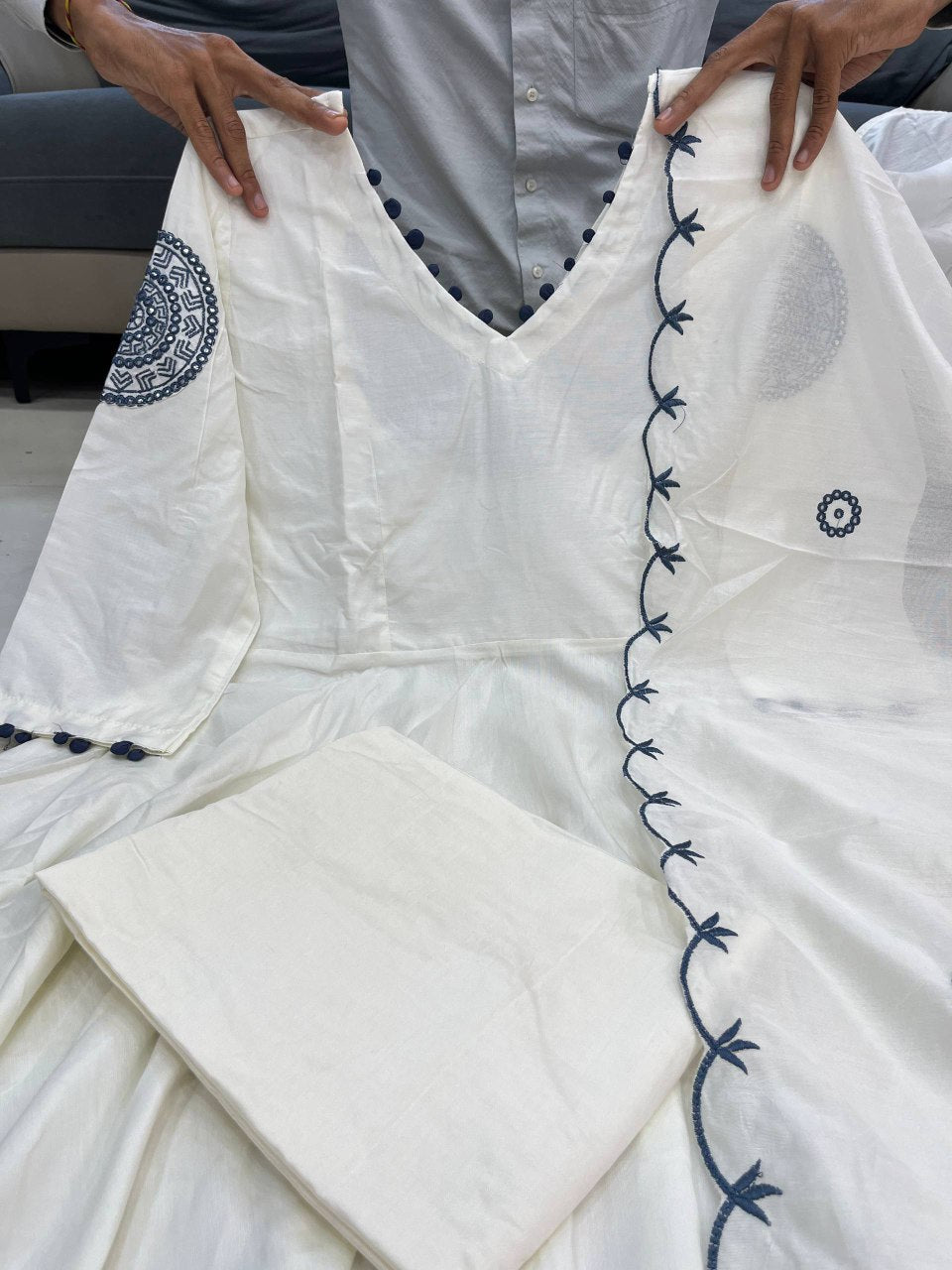 Soft Flowing White Long kurta with V-Neckline and Elegant Embroidered Sleeves
