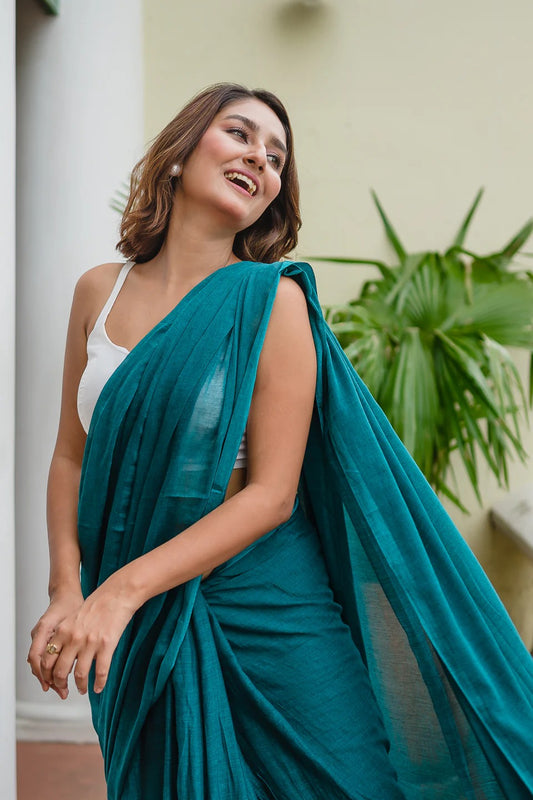 Teal blue plain khadi cotton saree with fancy tassel work