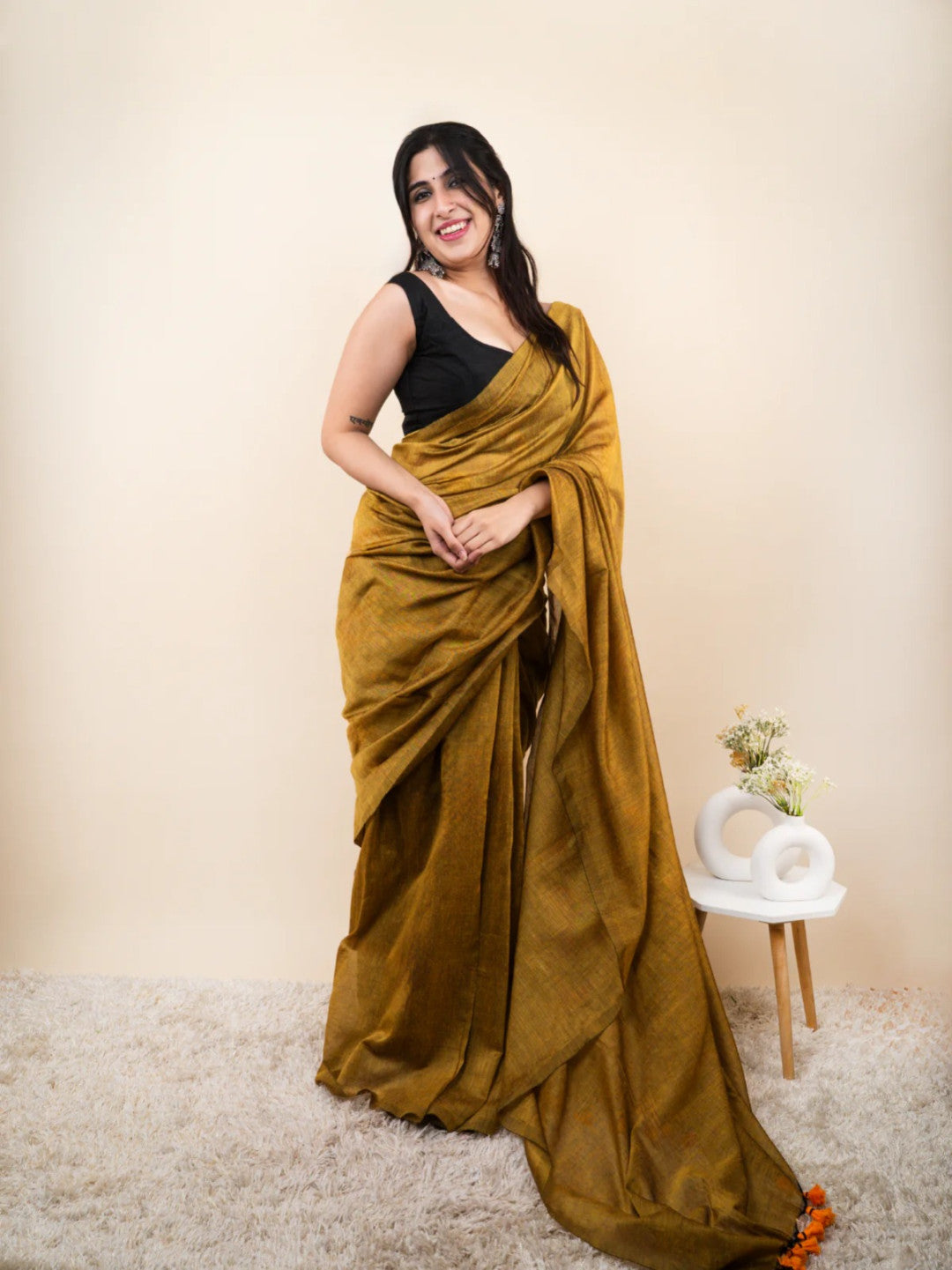 Mustard yellow plain khadi cotton saree with fancy tassel work