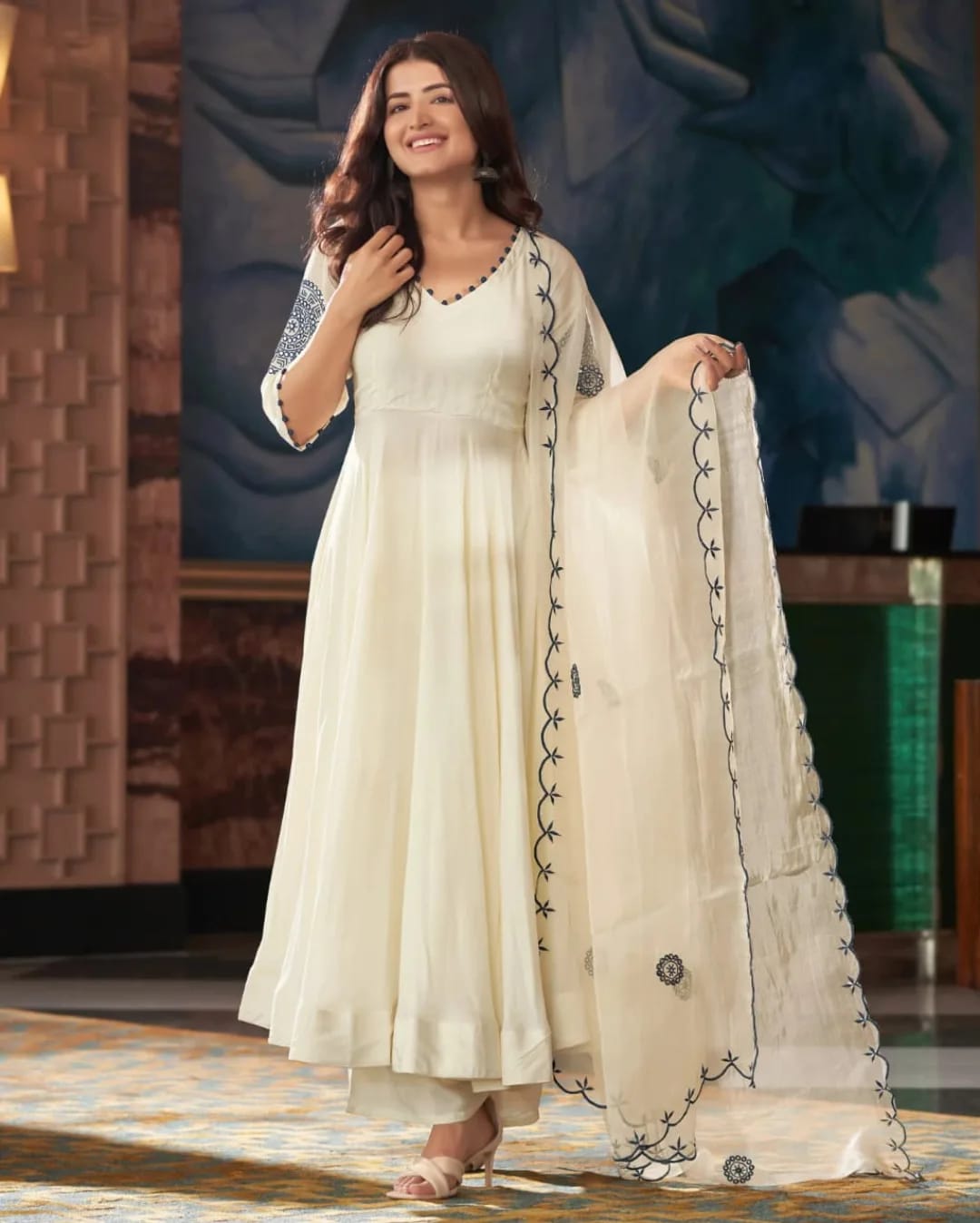 Soft Flowing White Long kurta with V-Neckline and Elegant Embroidered Sleeves
