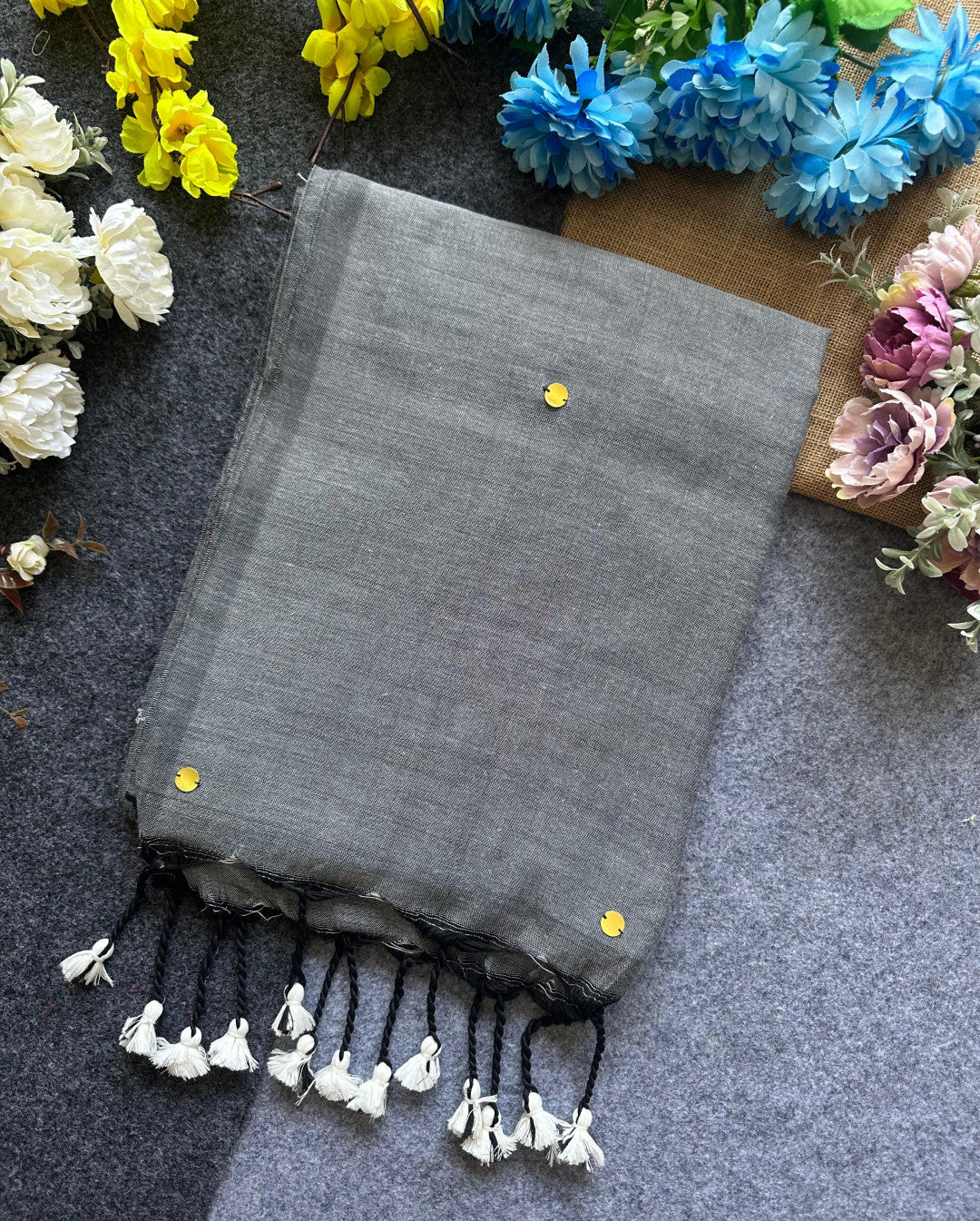Gray plain khadi cotton saree with ginni and fancy tassel work