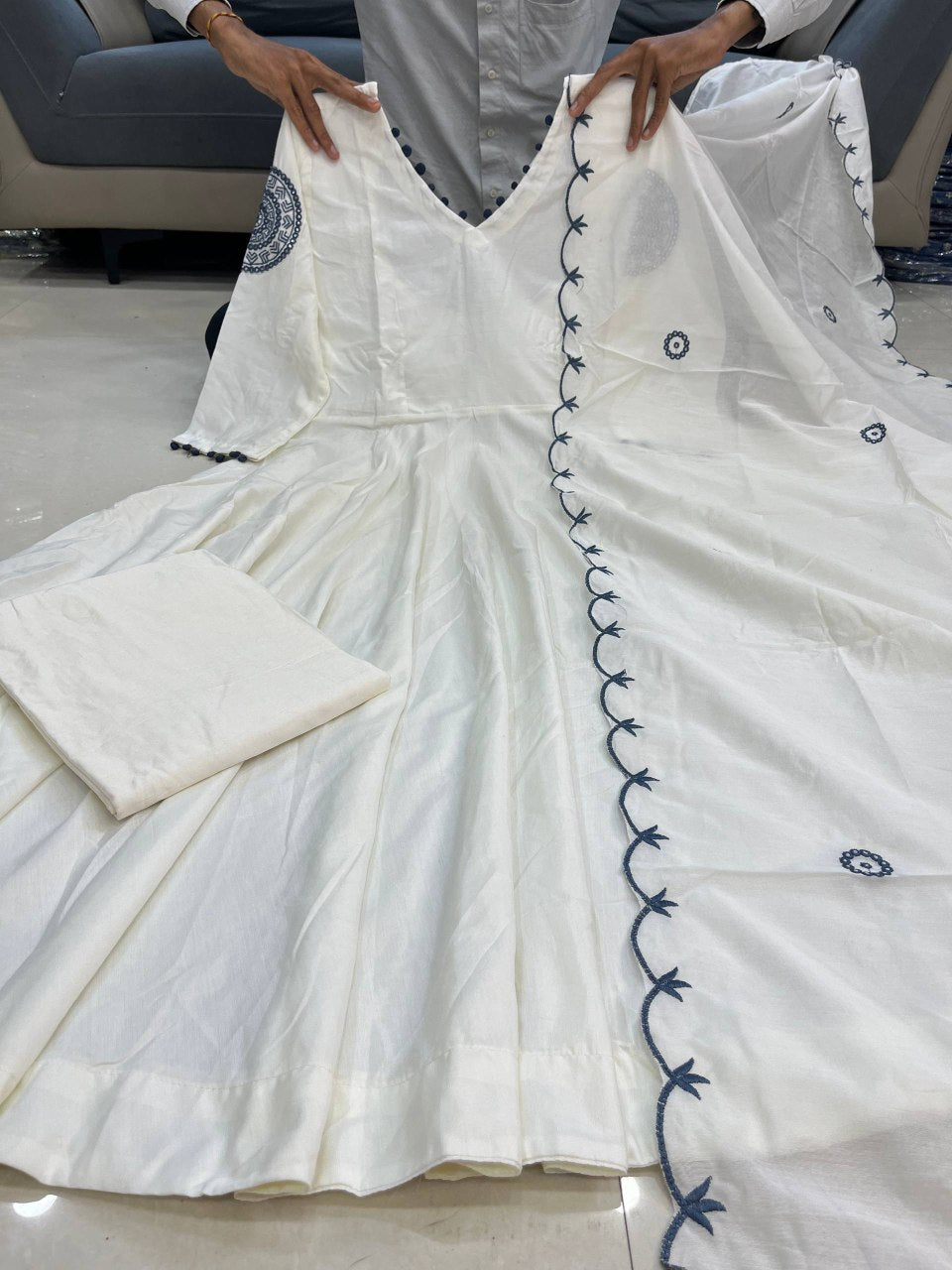 Soft Flowing White Long kurta with V-Neckline and Elegant Embroidered Sleeves