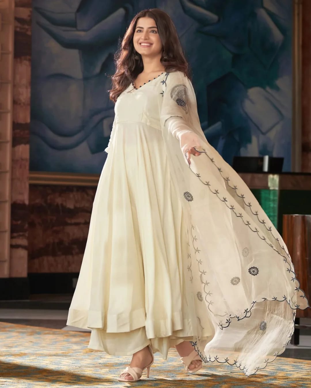 Soft Flowing White Long kurta with V-Neckline and Elegant Embroidered Sleeves
