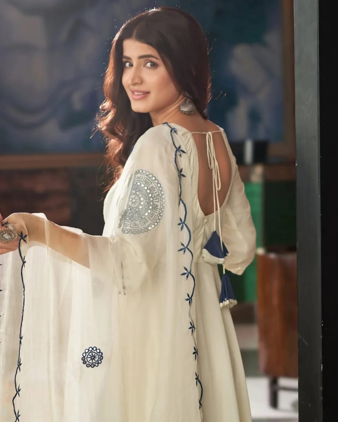 Soft Flowing White Long kurta with V-Neckline and Elegant Embroidered Sleeves