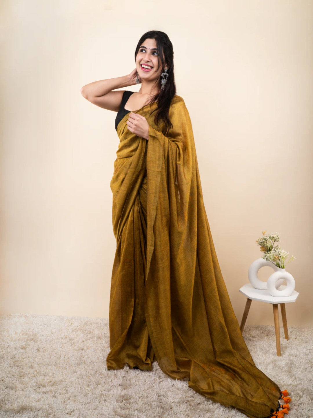 Mustard yellow plain khadi cotton saree with fancy tassel work