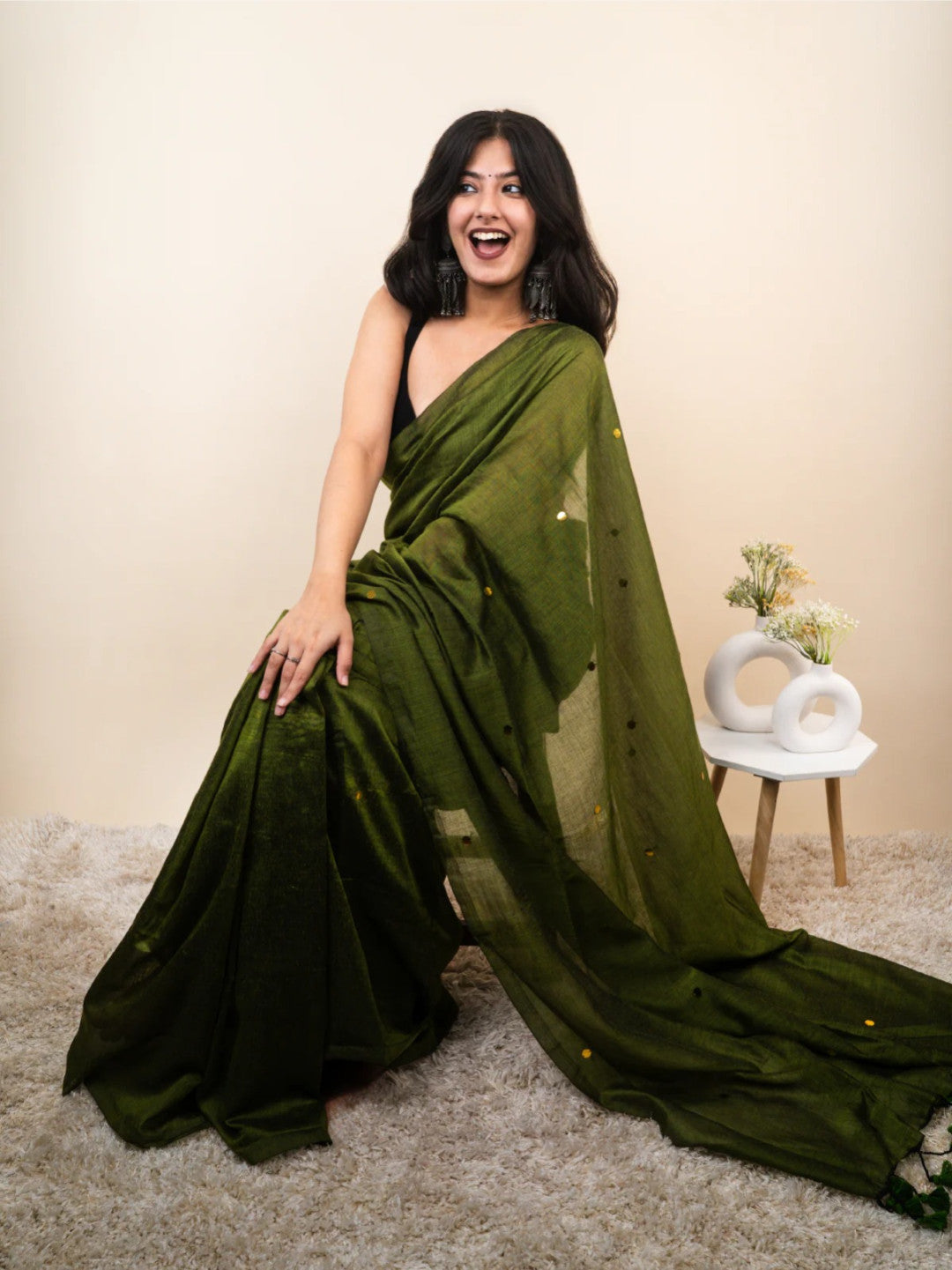Mehndi green plain khadi cotton saree with ginni and fancy tassel work