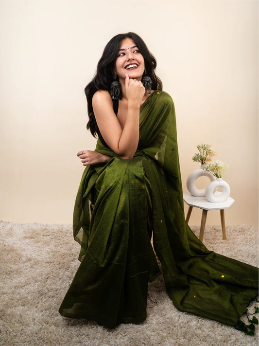 Mehndi green plain khadi cotton saree with ginni and fancy tassel work