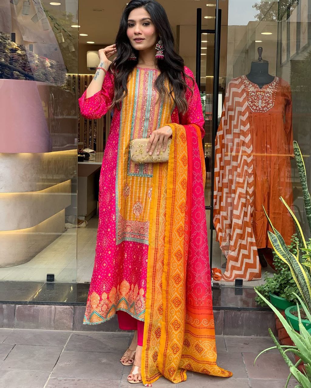 Pink and orange muslin silk kurta and pent set with bandhani printed dupatta