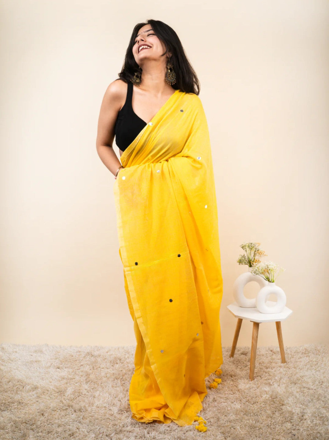 Yellow plain khadi cotton saree with ginni and fancy tassel work