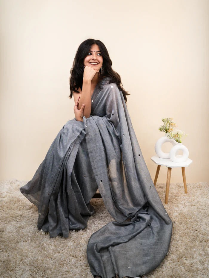 Gray plain khadi cotton saree with ginni and fancy tassel work