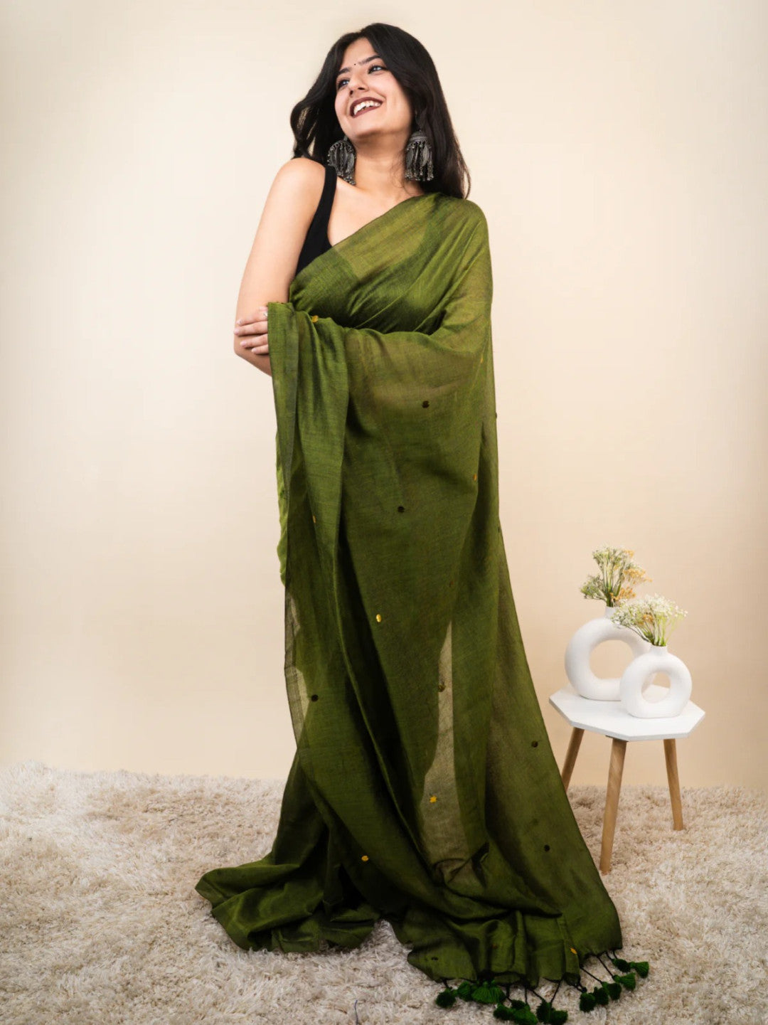 Mehndi green plain khadi cotton saree with ginni and fancy tassel work