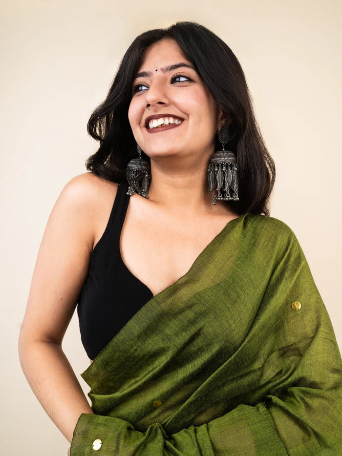 Mehndi green plain khadi cotton saree with ginni and fancy tassel work
