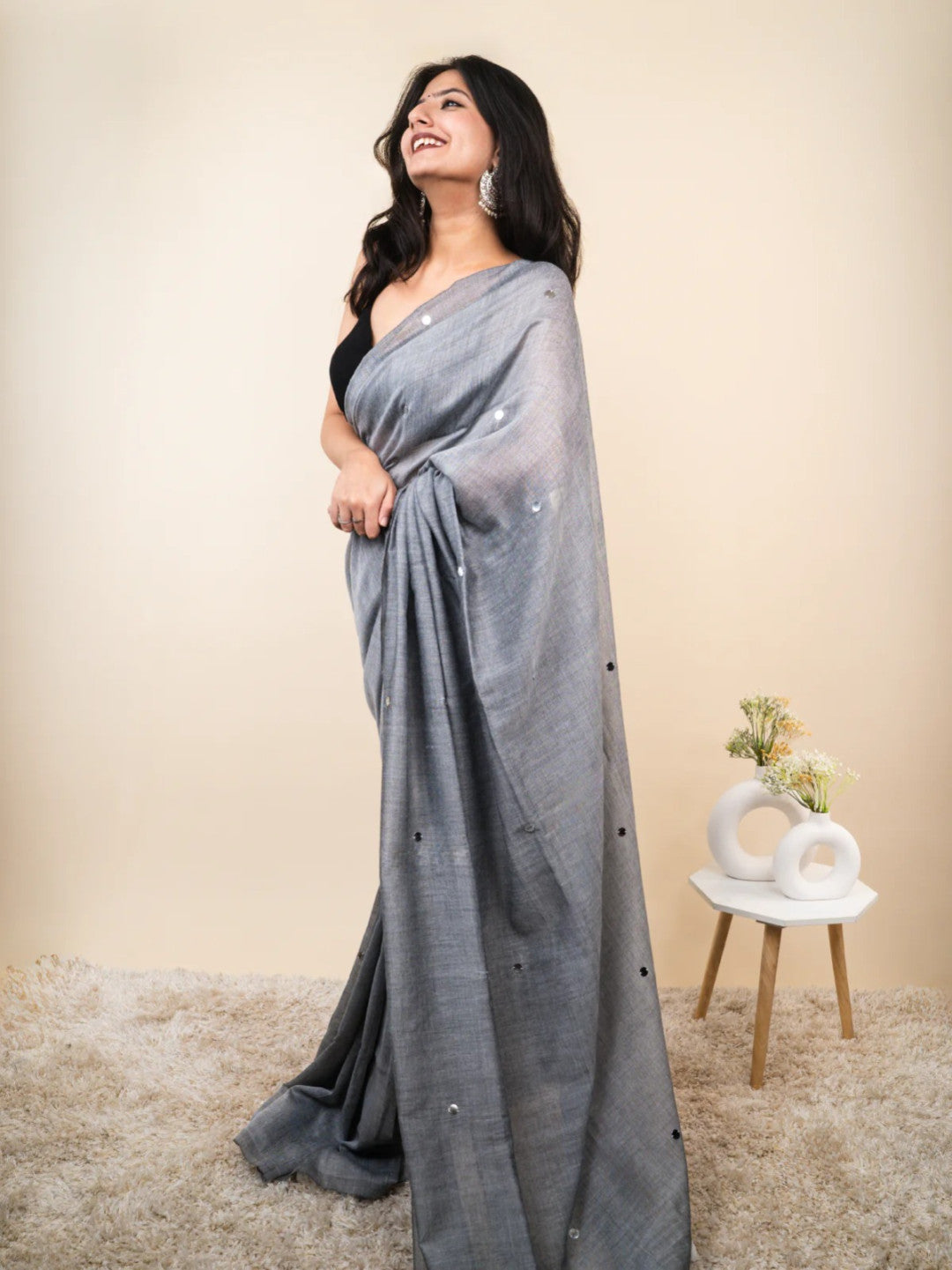 Gray plain khadi cotton saree with ginni and fancy tassel work