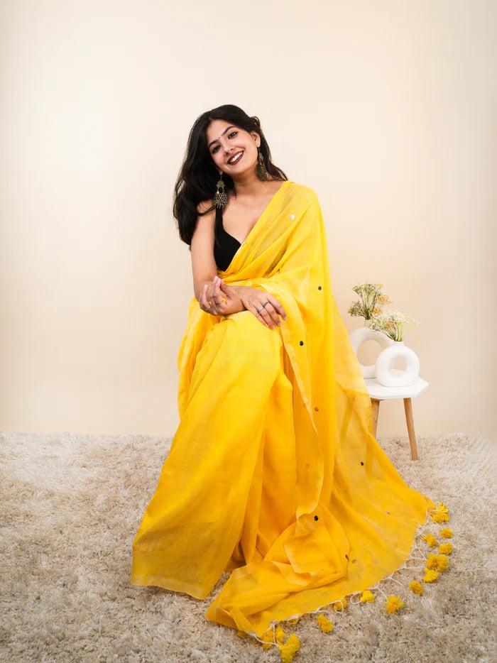 Yellow plain khadi cotton saree with ginni and fancy tassel work