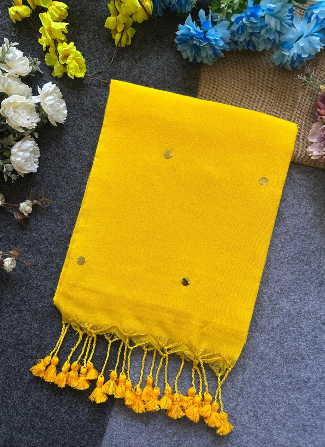 Yellow plain khadi cotton saree with ginni and fancy tassel work