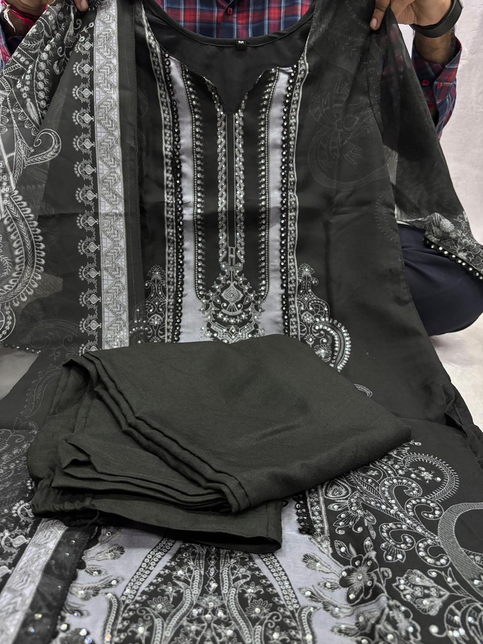Black organza silk kurta and pent set with dupatta thread and sequence work