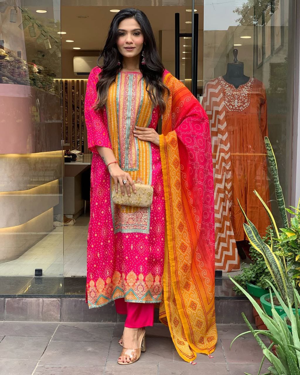 Pink and orange muslin silk kurta and pent set with bandhani printed dupatta