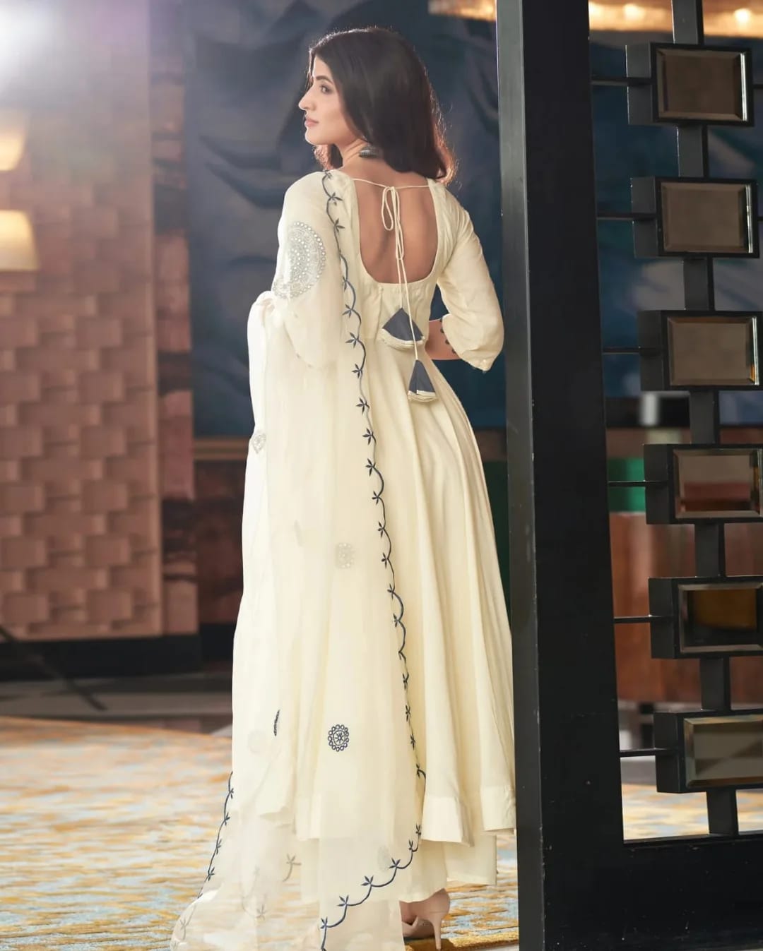 Soft Flowing White Long kurta with V-Neckline and Elegant Embroidered Sleeves